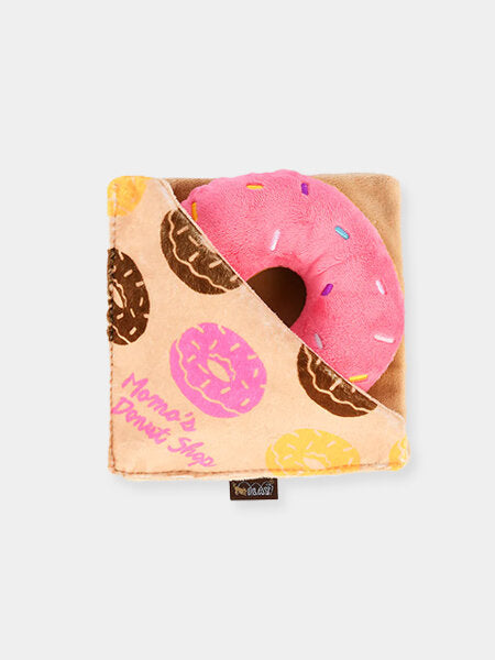 jouet en forme de grand donut rose pour chiens